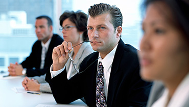 Two men and two women on a meeting