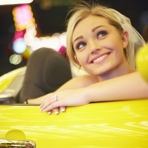 A Blond Woman Looking at a Photographer