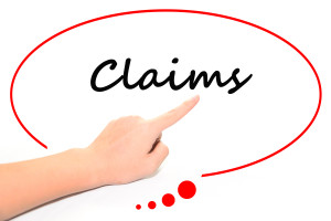 A hand pointing to a speech bubble with the word claims.