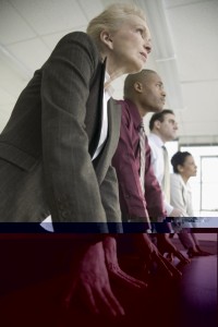 A group of business people standing in a line.