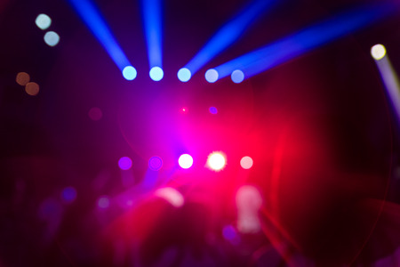 A blurred image of a concert stage.