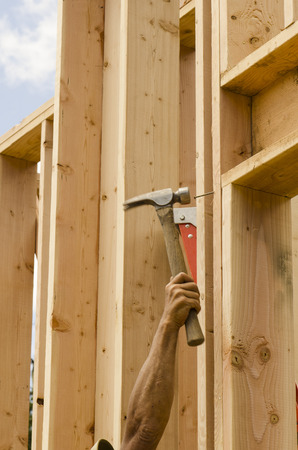 A man holding a hammer.