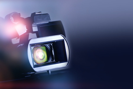 A video camera is shown on a dark background.