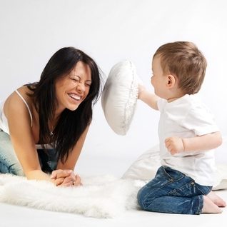 A woman and son having fun together